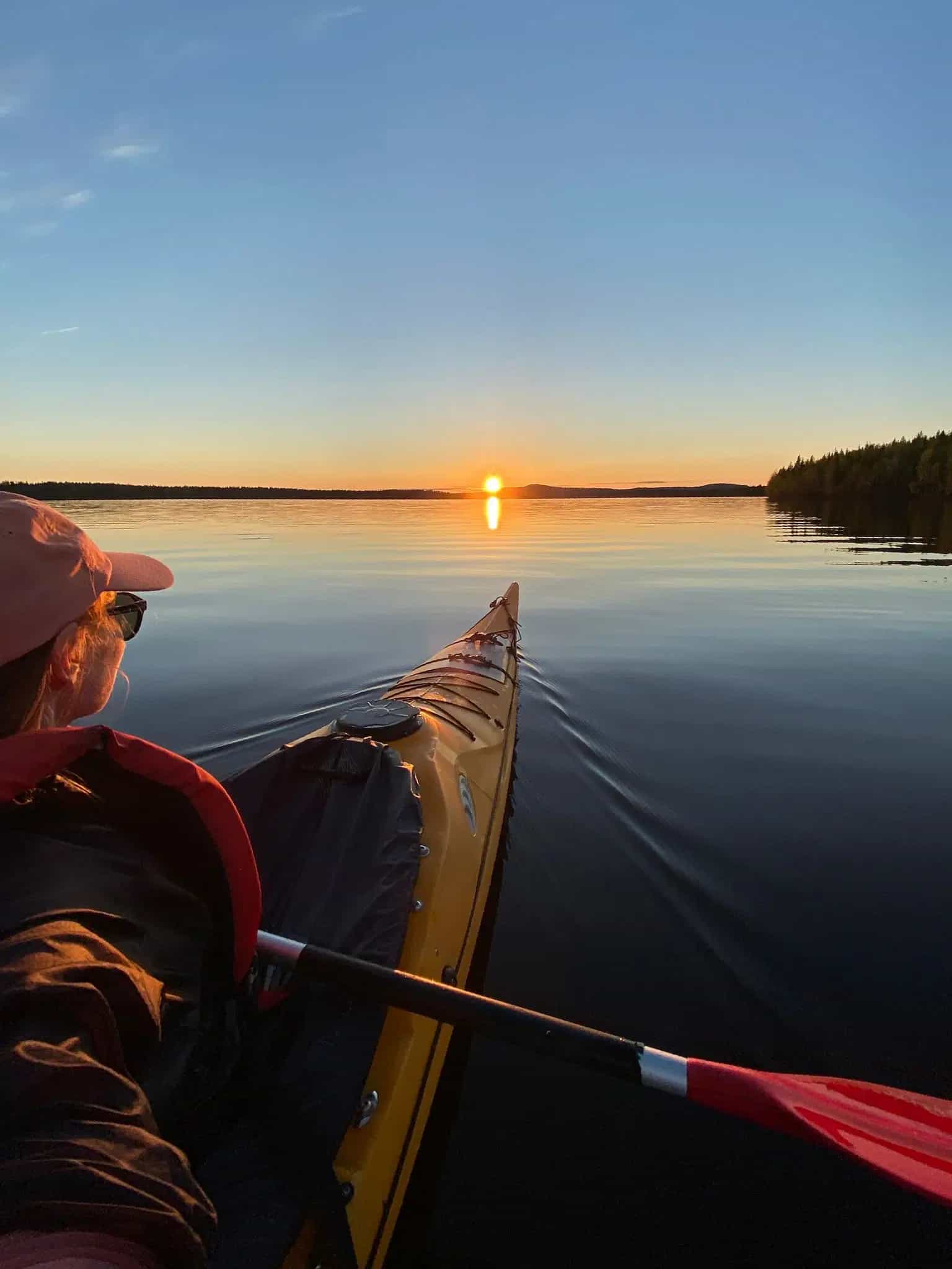 Canoeing on serene Finnish lake